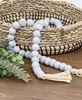 Picture of Distressed Wooden Bead Garland w/Jute Tassels